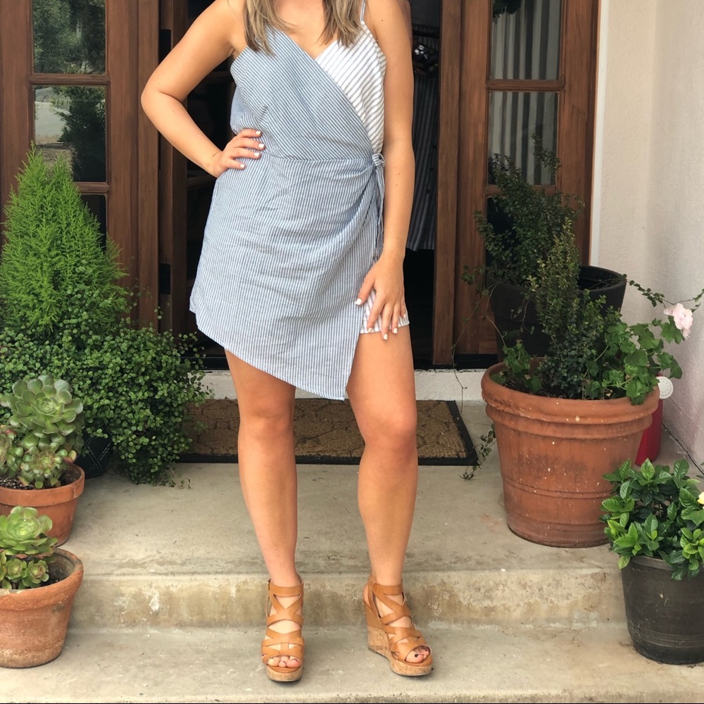 Adorable romper! Little shorts with a front dress panel